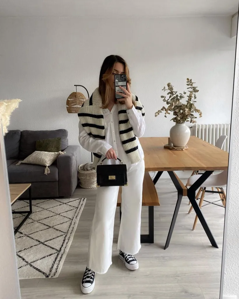 White Jeans Outfit Ideas for a Stylish Look 10 BLACK AND WHITE SWEATER DRAPE