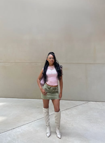 Stylish Jean Skirt Outfits for a Trendy Look 9 Crop Tee Top, Mini Jean Skirt, and White Knee-Length Boots