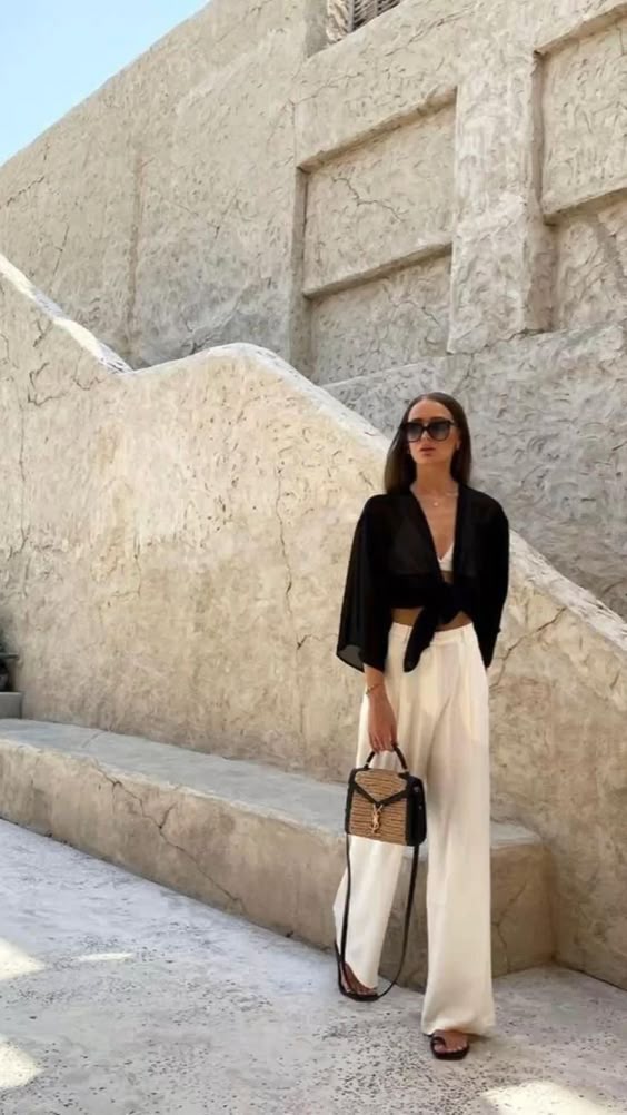 Stunning Cancun Mexico Outfits for a Stylish Vacation 15 Flowy White Linen Pants with Black Top