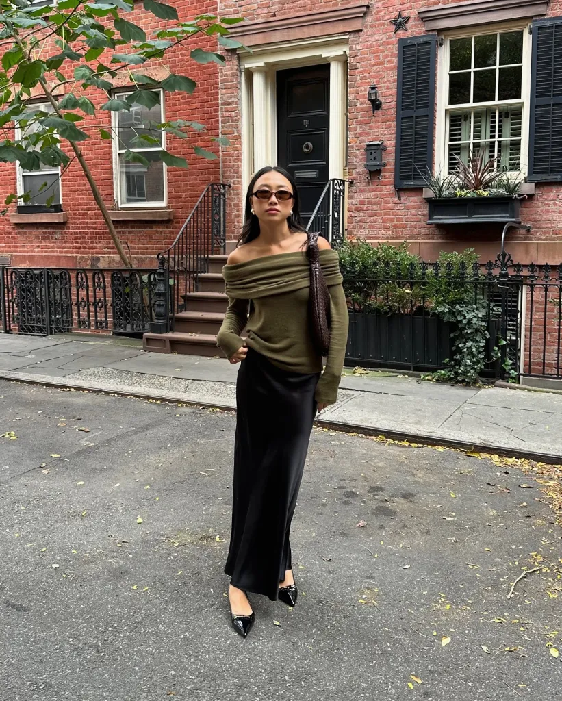 Black Maxi Skirt Outfit Ideas for a Stylish Look 8 Green Off-the-Shoulder Top, Black Satin Skirt, and Black Kitten Heels