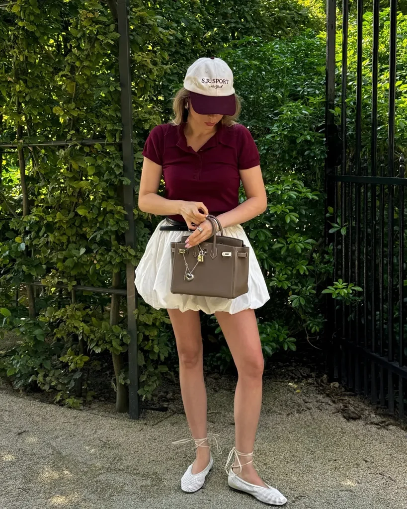 Italian Outfits Style Guide for a Chic and Elegant Look 9 Red Polo, White Ballon Skirt, and Flat Shoes