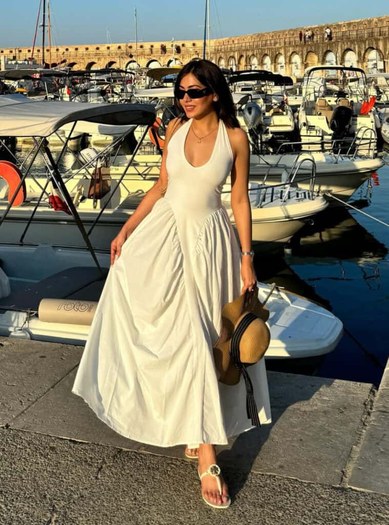 Chic France Outfits for Effortless Style 2 White Dress Sunglasses Flip Flops