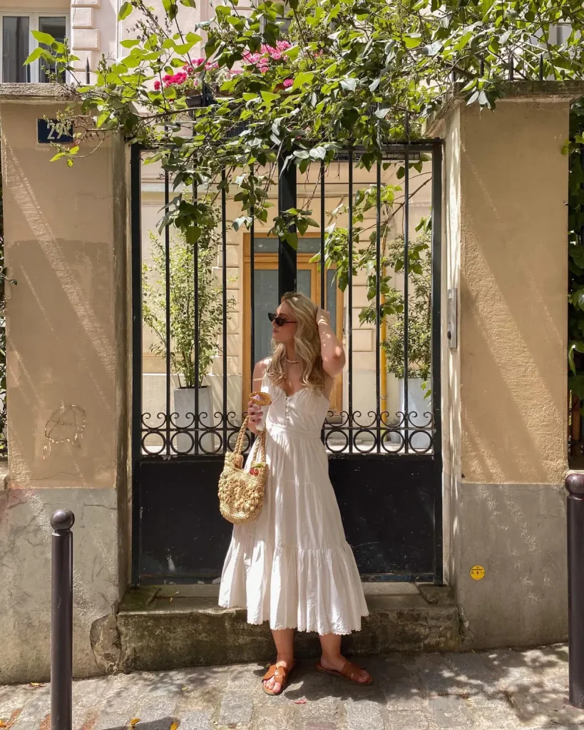 Italian Outfits Style Guide for a Chic and Elegant Look 8 White Flowy Dress and Hermes Oran Sandals